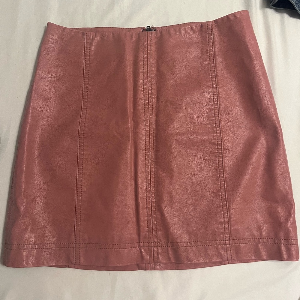 Older free people skirt. Used. Leather/pleather type material. Super cute.